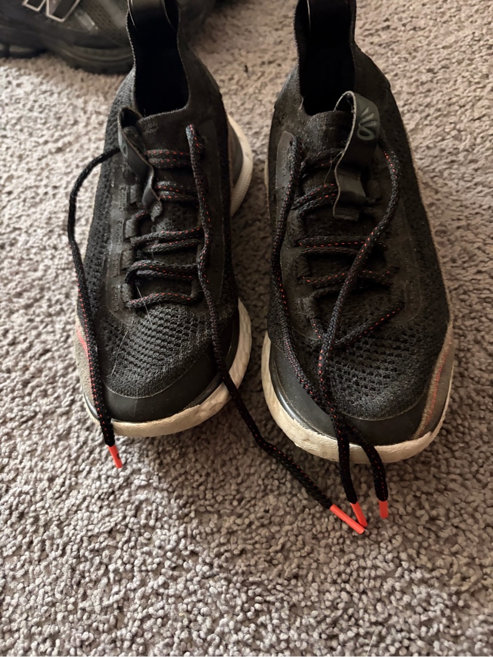 Under Armour Black Athletic Running Shoes with Red Accents